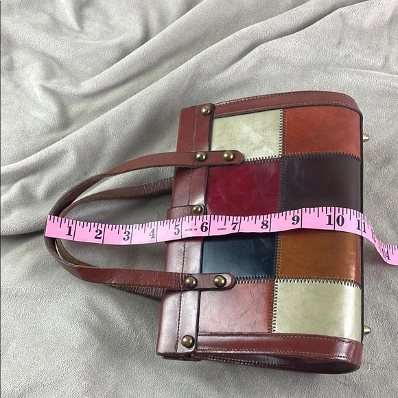 Vintage Brown Satchel with Structured Design and Metal Accents - Picture 14 of 15